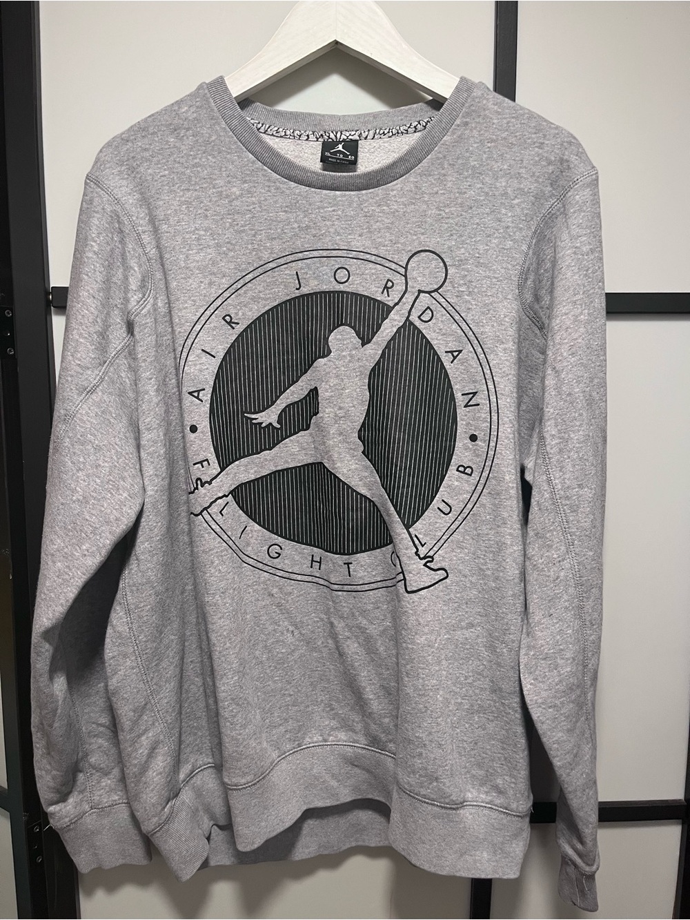 Classic Nike Air Jordan Flight Club crewneck sweatshirt in heather gray. Feature